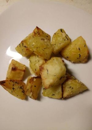 A picture of Thyme and Parmesan roasted potatoes.