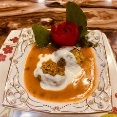 A picture of Paneer stutted kofta curry.