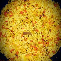 A picture of Chicken fried rice.