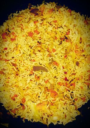 A picture of Chicken fried rice.