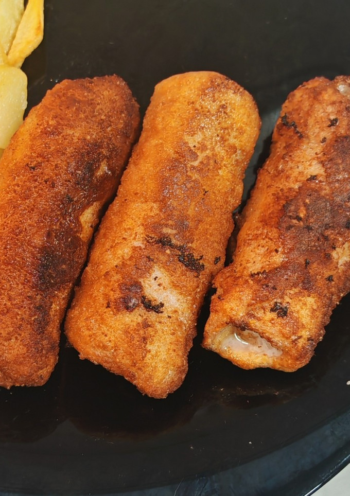 Una foto de Rollitos de jamón serrano y queso
