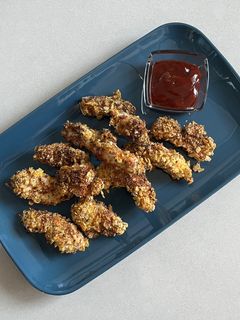Una foto de Pollo rebozado en Corn Flakes