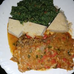 A picture of Seveve (pumpkin leaves), Ugali with Fish.