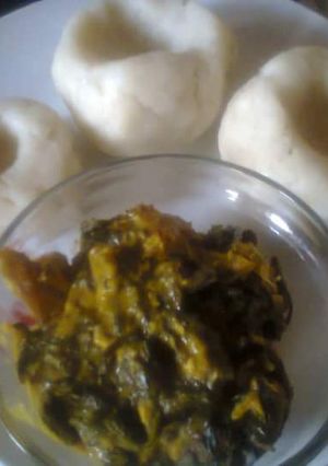 A picture of Bitterleaf Soup and pounded yam.