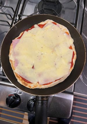 Una foto de Pizza al sartén