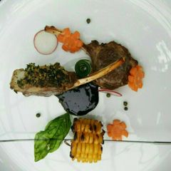 A picture of Lamb rack with herb crust.