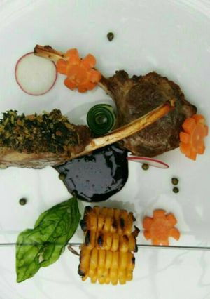 A picture of Lamb rack with herb crust.