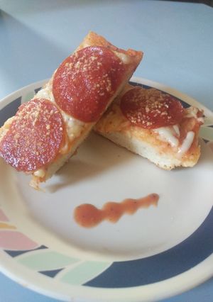 A picture of Garlic bread pizza.