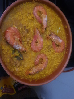 Una foto de Arroz con pollo y almejas