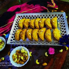 Sooji Dry fruits Gujhiya Mawa Gughra Rava Karanji A picture of Sooji Dry fruits Gujhiya Mawa Gughra Rava Karanji.