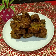 Tea Time Crispy Kothimbir Vadi A picture of Tea Time Crispy Kothimbir Vadi.