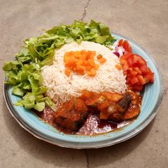 A picture of White rice and salad.