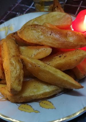 A picture of Potato wedges.