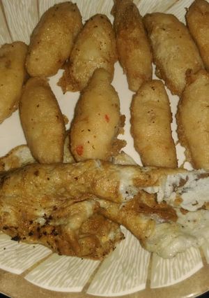 A picture of Potatoes in egg.