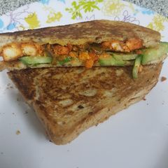 A picture of Smoky flavoured Paneer Tikka Sandwich.