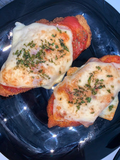 Una foto de Milanesas napolitana