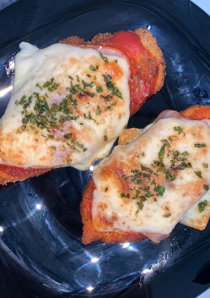 Una foto de Milanesas napolitana