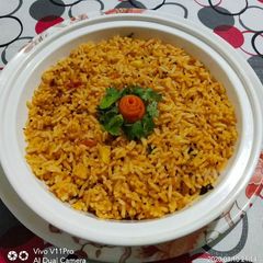 A picture of Garlic Tomato Rice.