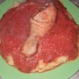 Polenta con salsa y pollo