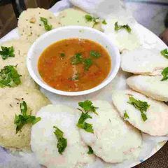 A picture of Yummy sambar idli dosa.