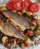 Pan fried sea bass fillets with mediterranean potato salad