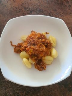 Una foto de Ñoquis con Salsa Boloñesa