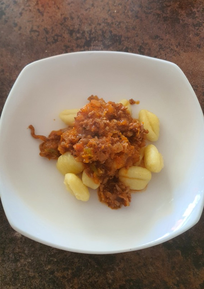 Una foto de Ñoquis con Salsa Boloñesa