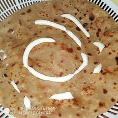 A picture of Achari Chicken Paratha.