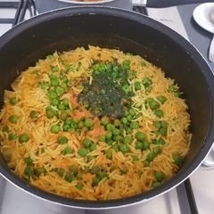A picture of Peas and potato rice.