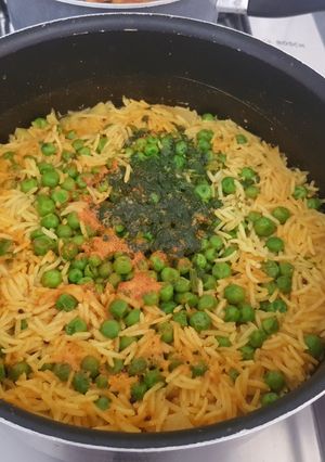 A picture of Peas and potato rice.