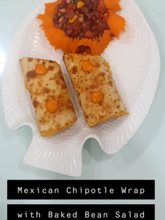 A picture of Mexican chipotle wrap + Baked bean salad.