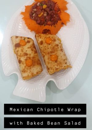 A picture of Mexican chipotle wrap + Baked bean salad.