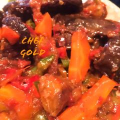 A picture of White rice with Gizzard dodo.