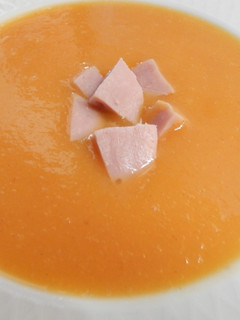 Una foto de Crema de calabaza y mango