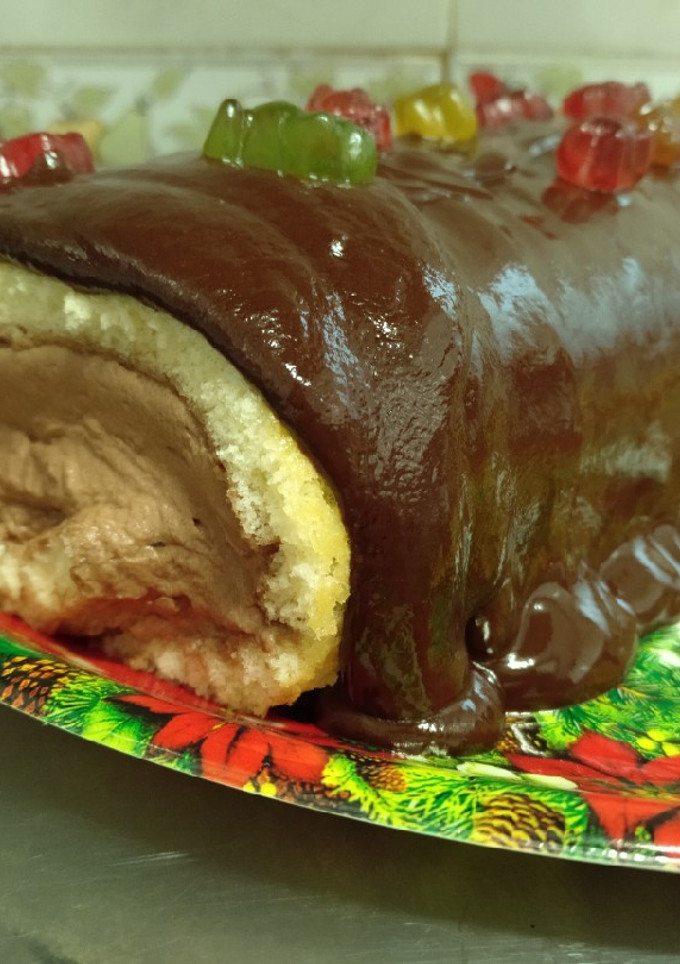 Una foto de Brazo de trufa y chocolate o Tronco de Navidad