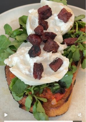 A picture of Burrata Toast with Tomato Jam and Lap Cheong.