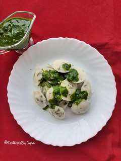 A picture of Ginger Fenugreek Idli With Spinach Sauce.