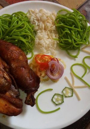 A picture of Coloured Rice and Chicken.
