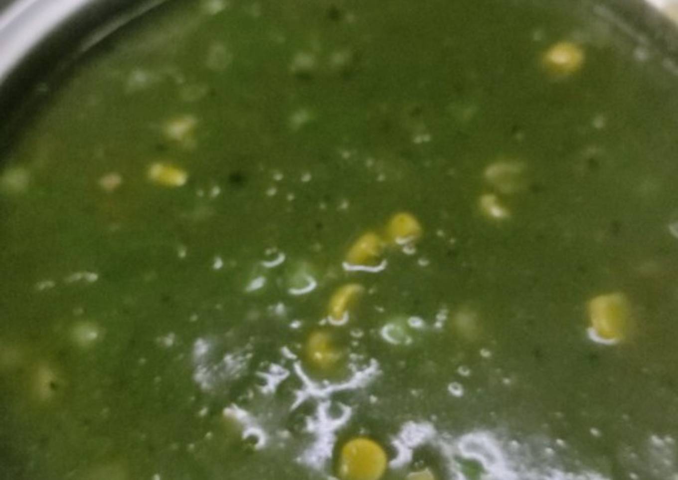 Winter homemade palak saag, peas, corn soup