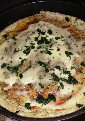 Una foto de Pizza integral