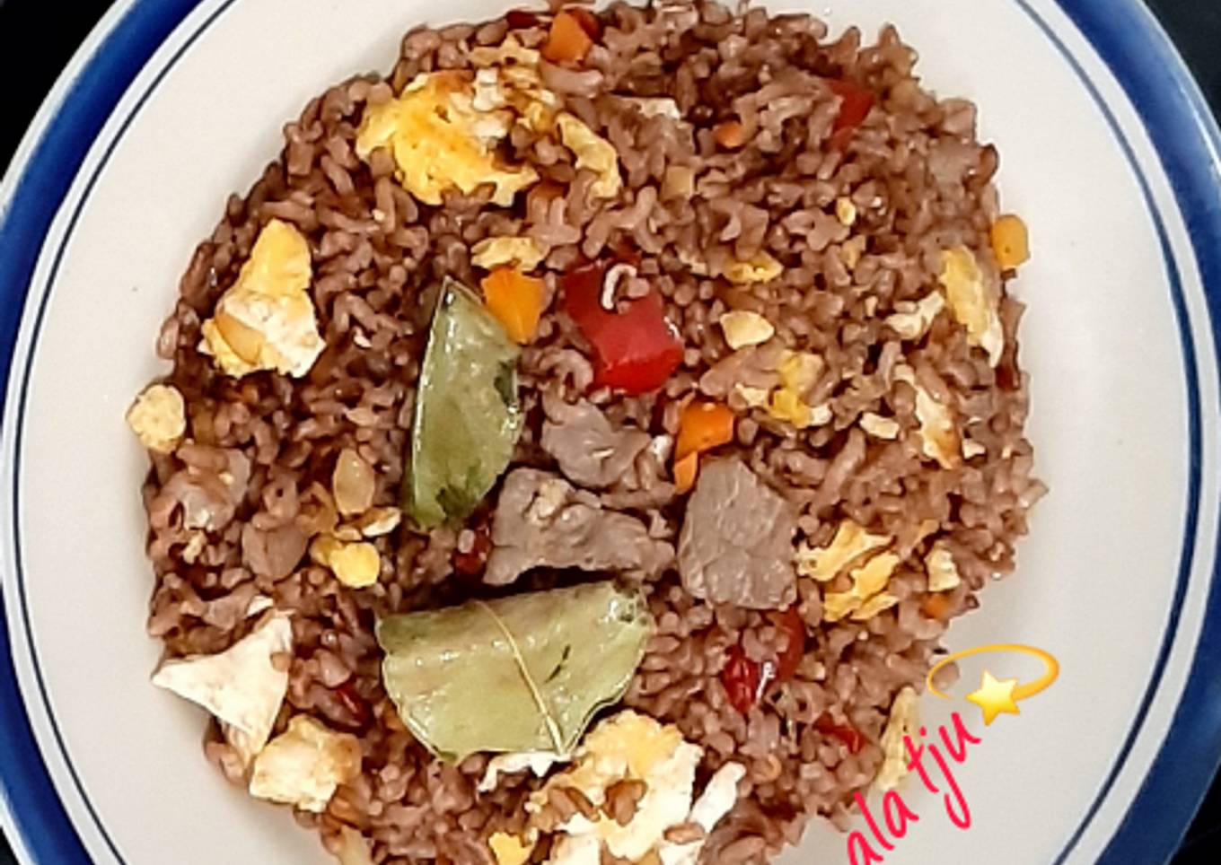 50. Nassour Merah (nasi merah).