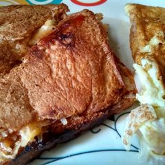A picture of Sandwich and omelette.