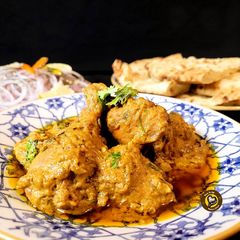 Nezami Dum Murgh Or Hyderabadi Dum Chicken A picture of Nezami Dum Murgh Or Hyderabadi Dum Chicken.