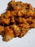 Ñoquis en salsa de tomate y quesos
