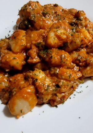 Una foto de Ñoquis en salsa de tomate y quesos