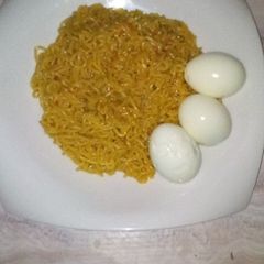 A picture of Simple indomie and boiled eggd.