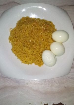 A picture of Simple indomie and boiled eggd.