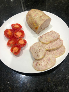 Una foto de Rulo de Pollo, Jamón de York y Queso