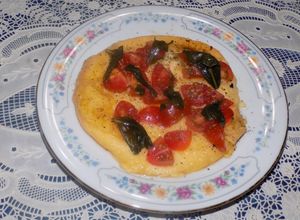 Una foto de Quesuco Pascual con papas a la chapa