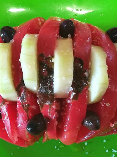 Una foto de Tomate Hasselback